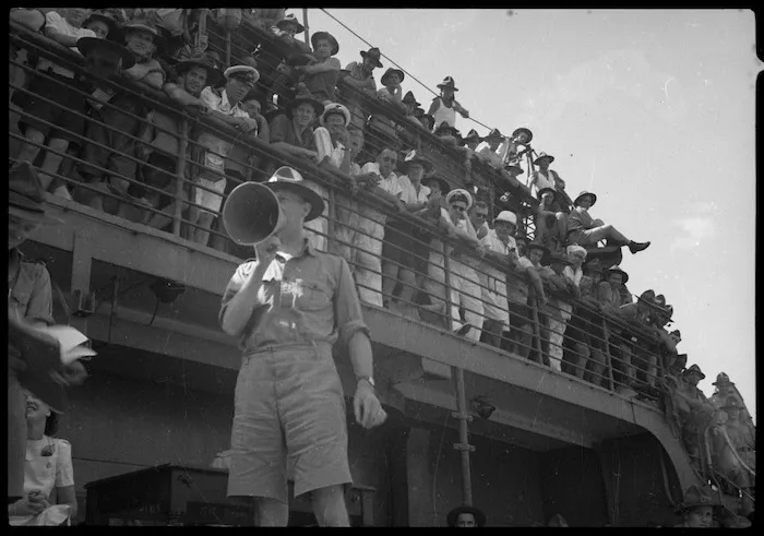 Col A S Falconer acting as announcer during crossing the line ceremonies