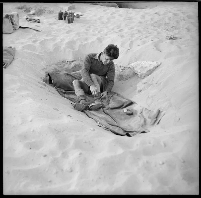 New Zealand World War 2 soldier in typical sleeping conditions in the Western Desert, North Africa