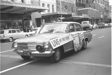 Car decorated with road safety posters, 1965 Image: Car decorated with road safety posters, 1965
