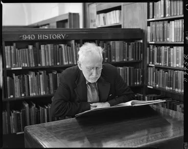Image: Man reading in the History section of Wellington Central Library - Photograph taken by W Wilson