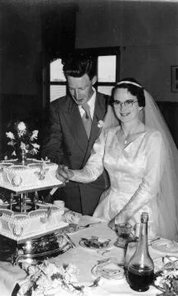 Image: Laurie and June King cut their wedding cake : digital photograph