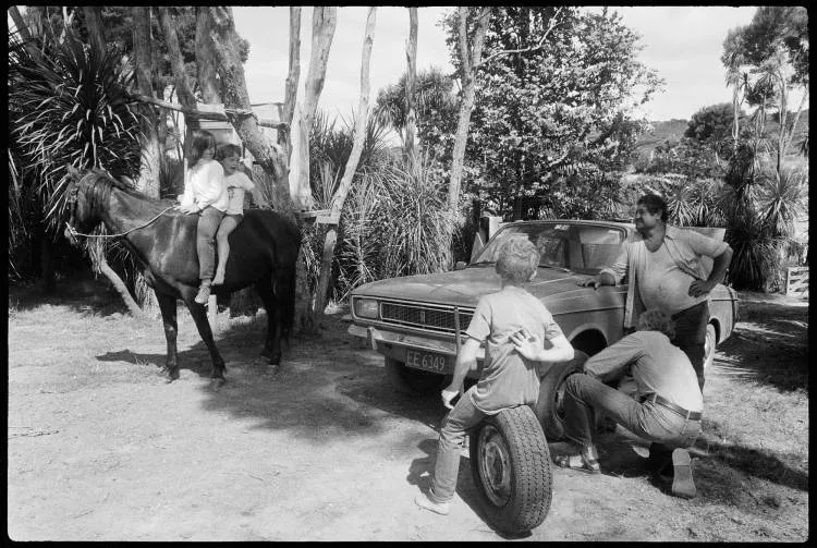 Changing a tyre, Te Hāpua, 1986