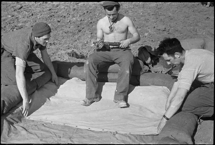 NZ infantrymen rest immediately behind the lines on the Cassino Front, Italy, World War II - Photograph taken by George Kaye