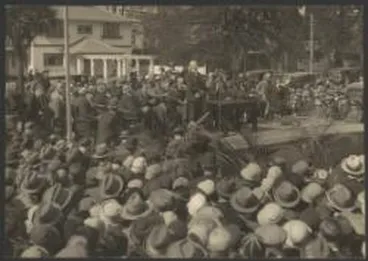 Image: Sir Heaton Rhodes speaking at civic reception, with Charles Kingsford Smith in RAAF uniform, Charles Ulm and T.H. McWilliam seated in front row, Christchurch, New Zealand, 11 September 1928 / Weekly Press