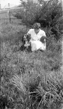 Woman with two dogs : digital image