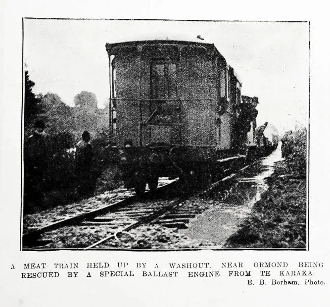 A meat train held up by a washout, near Ormond being rescued by a special ballast engine from Te Karaka