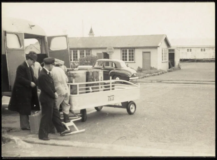 Trans-Australia Airlines luggage trolley at an unknown airport