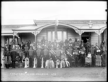 Image: Members of a brass band, and others, outside the house of Charles Waitara, at Parihaka