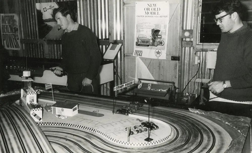 Slot-racing model cars in Ron Poppleton's garage; Peter Messenger, Alex Vlassoff.