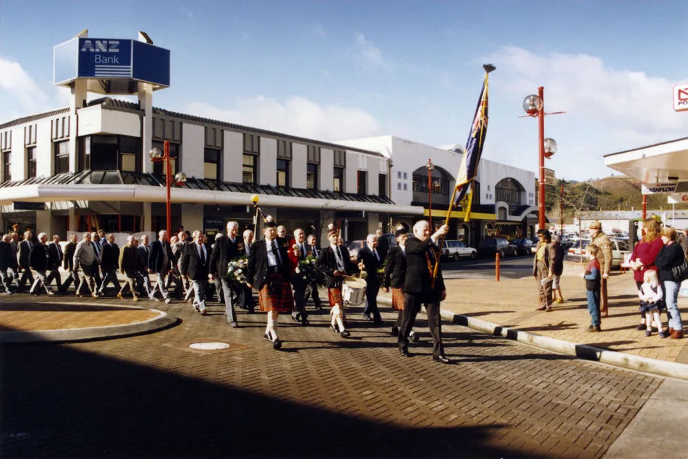 V J Day 50th anniversary parade in Main Street; RSA, led by flag bearer John Montgomery.