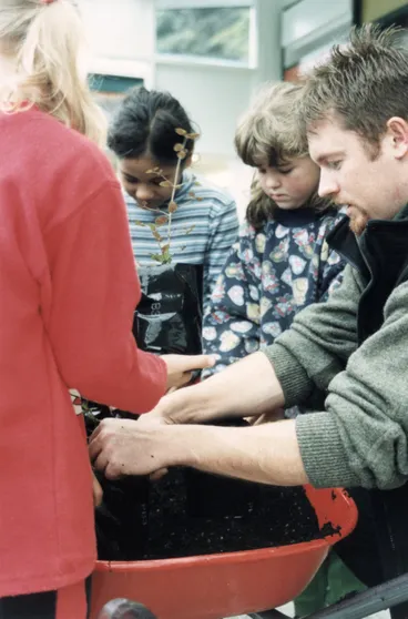 Image: Plateau School; pupils planting around 500 seedlings at Kaitoke Regional Park, for Arbor day 2001.