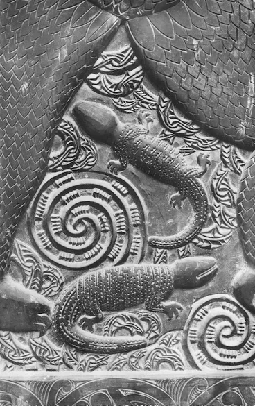 Image: Maori wooden carving featuring spirals and lizard type shapes