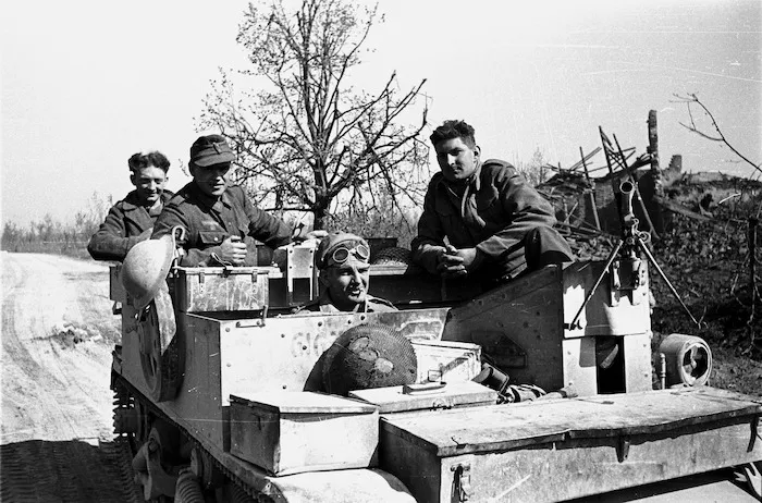 Kaye, George, b 1914 : Two German prisoners being taken out of the line on a Bren carrier in the Senio sector, Italy, during the NZ Div advance
