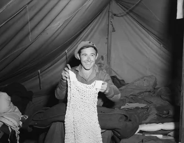 Image: Gunner Don Jackson with string vest, part of winter clothing issue, Korea