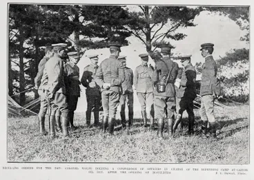 Image: RECEIVING ORDERS FOR THE DAY: COLONEL WOLFE HOLDING A CONFERENCE OF OFFICERS IN CHARGE OF THE DEFENDING CAMP AT CASTOR OIL BAY, AFTER THE OPENING OF HOSTILITIES