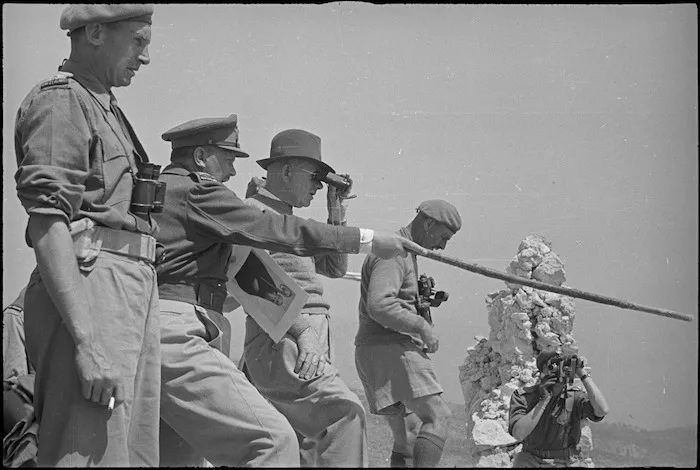 General Bernard Freyberg points out to Peter Fraser features of ruined town of Cassino, Italy, World War II - Photograph taken by George Kaye