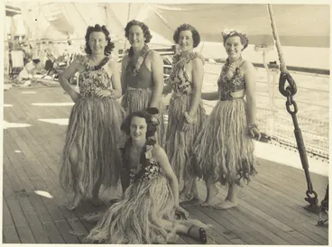 Image: Women in Hawaiian costume for a Women's War Service Auxiliary concert during World War 2