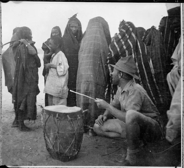 NZ soldier with Chad villagers