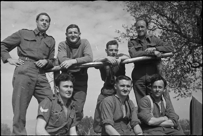 Group of NZ Infantry personnel resting after the fighting in Cassino, Italy, World War II - Photograph taken by George Kaye