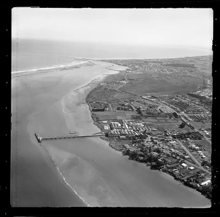 Wanganui freezing works and wharf and the mouth of the Whanganui River