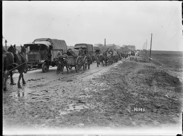 Image: New Zealand military transport moving along a road in Le Quesnoy, France