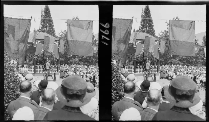 Large crowd of people gathered at the band rotunda, Queenstown, for an unidentified event, possibly the visit of the Duke of Gloucester
