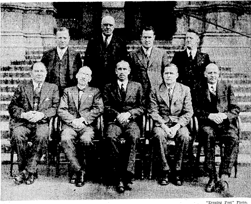 Members of the New Zealand Dental Council, recently set up under the new legislation, assembled in ■Wellington today for the first time. Standing, from left, Mr. 0. V. Davies (Dunedin), Mr. J.T. Cooper (Dunedin), Dr. P. P. Lynch (Wellington), Mr. C. J. Drake, secretary. Seated, Mr. W. P. Somerville (Wellington),- Professor R. B. Dodds (Dunedin), Mr. J. L. Sounders, chairman, Professor C. E. Hercus ■ ■■ (Dunedin), and Mr. J.N: Rishworth (Auckland). (Evening Post, 18 September 1937)