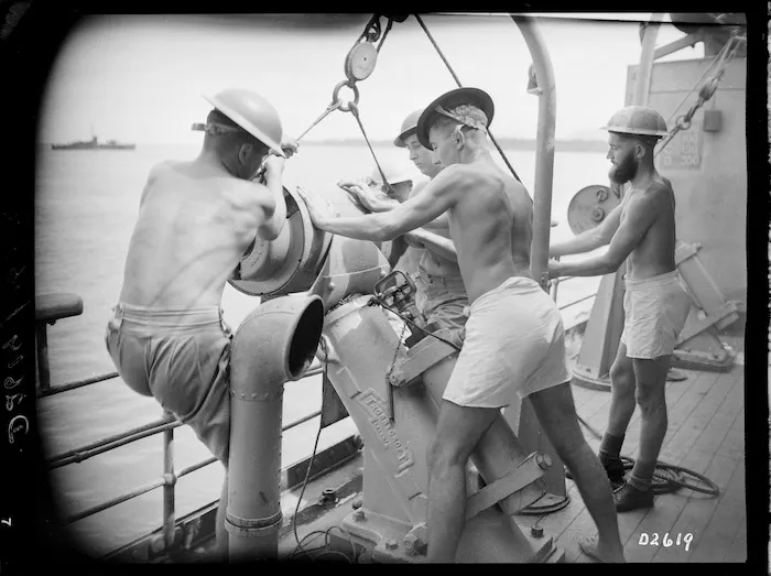 Sailors of the Royal New Zealand Navy in the Pacific participating in a depth charge drill during World War II
