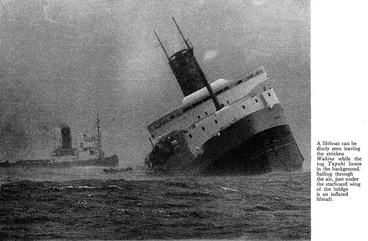 Image: A lifeboat can be dimly seen leaving the stricken Wahine while the tug Tapuhi looms in the background. Sailing through the air, just under the starboard wing of the bridge is an inflated liferaft
