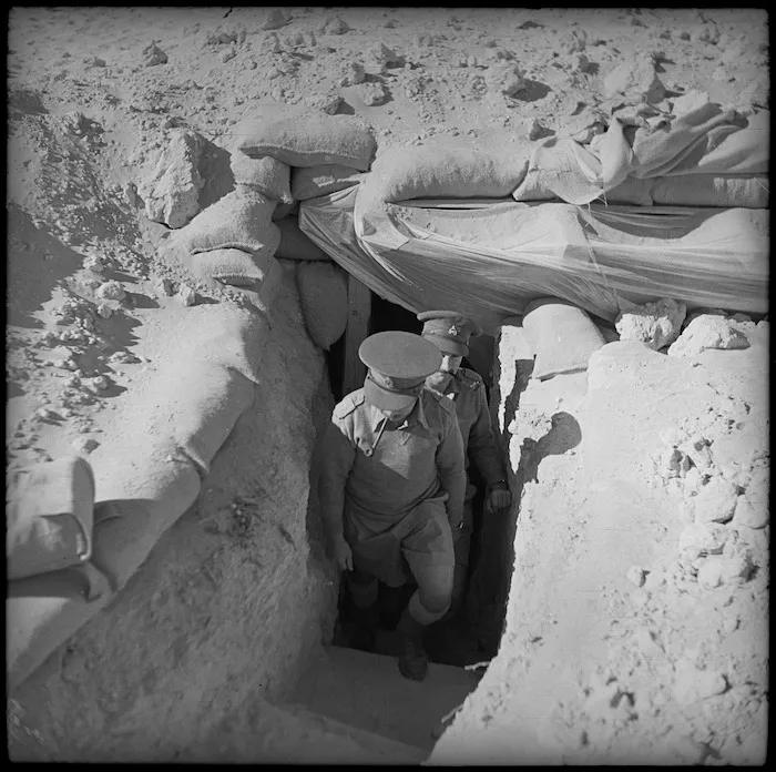 NZ Artillery officers emerging from office dugout, Egypt
