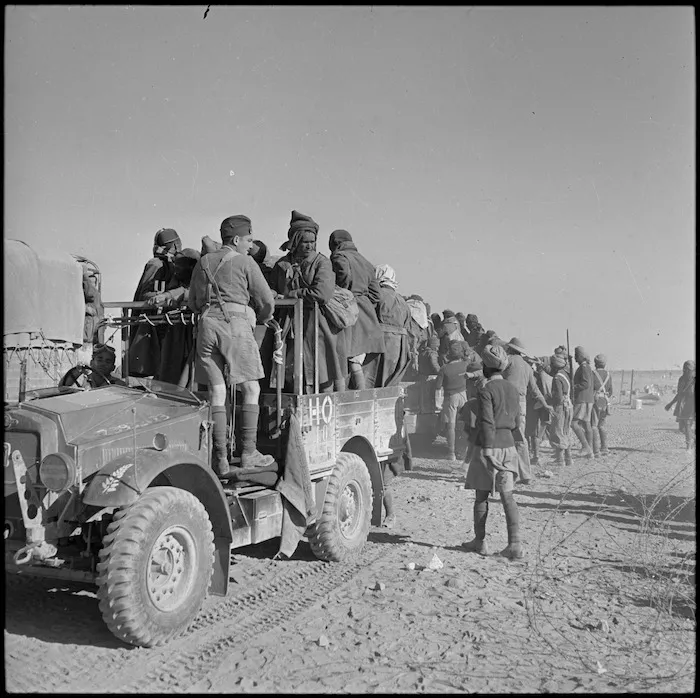 Libyan prisoners being transported on NZ trucks