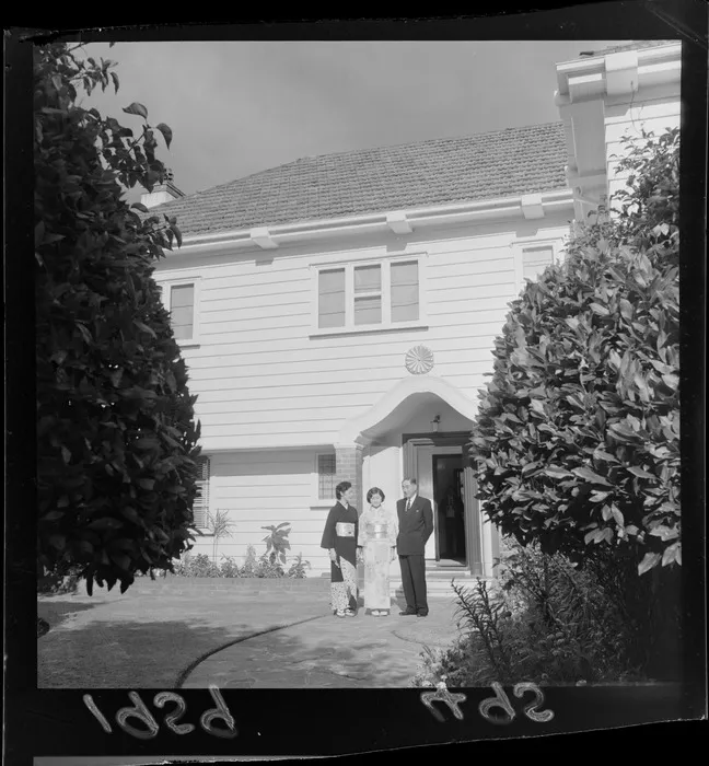 The Japanese ambassador Mr H Shimadzu with his wife and daughter, outside their official residence