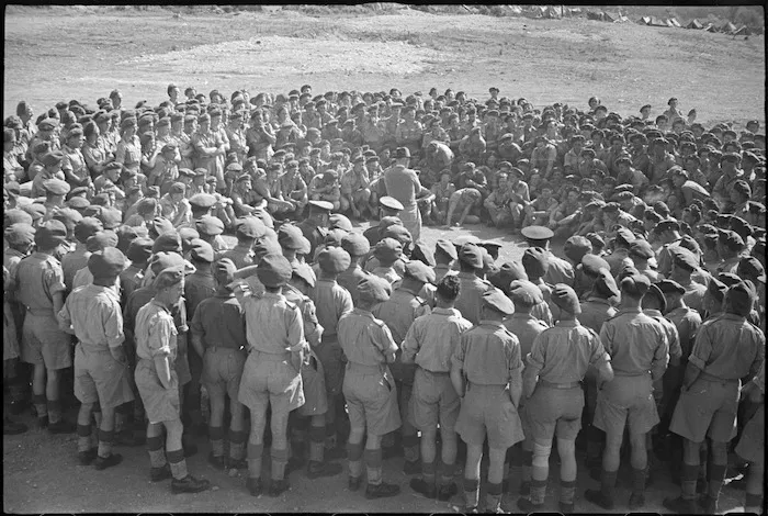 NZ troops grouped around Prime Minister Peter Fraser during visit to the Cassino area, Italy - Photograph taken by George Robert Bull