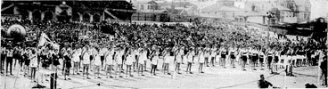 Image: A panoramic view of the Basin ReserveX during the Kitto x Shield parade, at which the Minister of Internal Affairs (the Hon. W. E. Parry) took the salute. This ivas one of the principal happenings at the Wellington provincial amateur athletic championships on Saturday afternoon. (Evening Post, 27 February 1939)