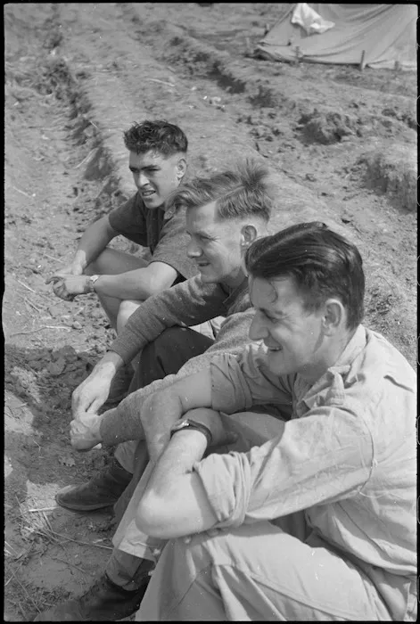 Three NZ Infantrymen resting behind the line after recent heavy fighting for Cassino, Italy, World War II - Photograph taken by George Kaye