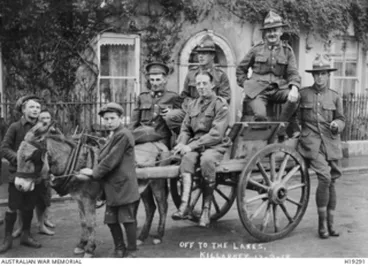 Image: Killarney, Ireland. 13 September 1918. A small group of Australian and New Zealand soldiers boarding a donkey cart taking them to view the famous Killarney Lakes