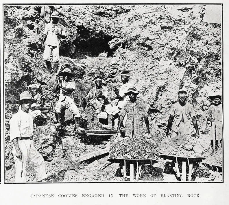 Japanese coolies engaged in the work of blasting rock