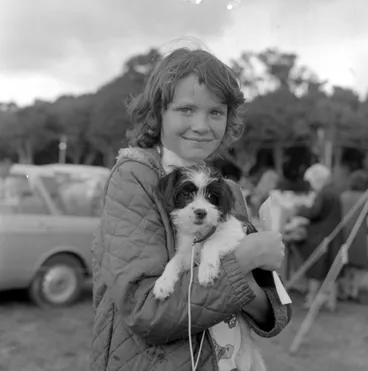 Image: A & P show; pet parade; girl and puppy