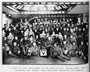 Image: A group of New Zealanders in the New Zealand Headquarters YMCA Shakespeare Hut, London, with the field secretary, Mr Blair (x)