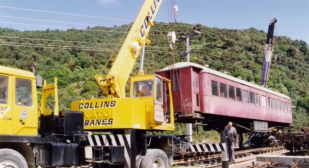 Silver Stream Railway; railway carriage A-1833 2; being lowered onto its wheels.