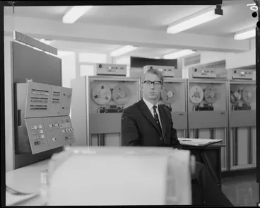 Image: Portrait of man with computers