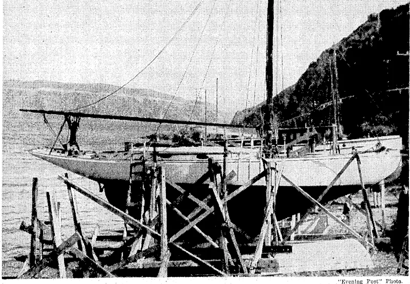 V • , , 7 7j SIGNING THE GERMAN-JAPANESE TREATY.—Herr yon Ribbcntrop signing the Berlin-Tokw Treaty ;0N THE 'HARD.—The yacht -Ailsa,-which-has recently changed hands;, being panned andoverhauled *■ Berlin on November2s. It is a five-year pact between Germany and Japan to fight Communism. ■ The. ..; m Bdeva Bay -before taking to the water, . , lapaneseJmbassaJor, Viscount Entomo Mushakoji, signed onbehalf-ofjapan. (Evening Post, 16 December 1936)