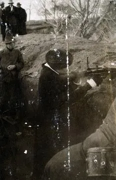 Eileen Adams firing a Lewis gun : digital image