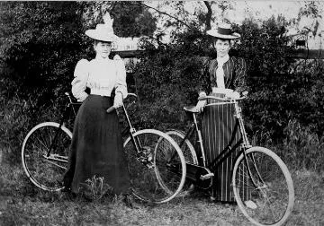 Two ladies with bicycles