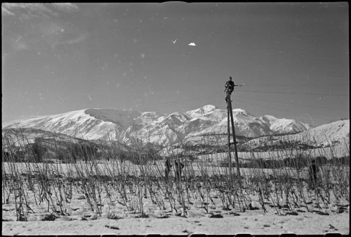 Linesman at work in the New Zealand Sector of the 8th Army Front, Italy World War II - Photograph taken by George Kaye