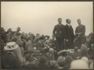 Image: [Charles Ulm, Charles Kingsford Smith and unidentified man surrounded by crowd, Wanganui, New Zealand, 1928?]