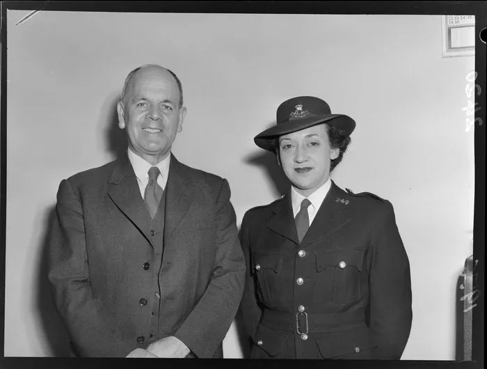 Pat Mathieson, first uniformed Māori policewoman, with unidentified official