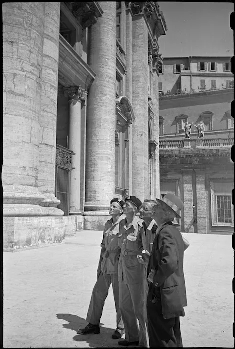 Guide pointing out features of St Peter's Basilica to World War II New Zealand soldiers on leave in Rome, Italy - Photograph taken by George Kaye