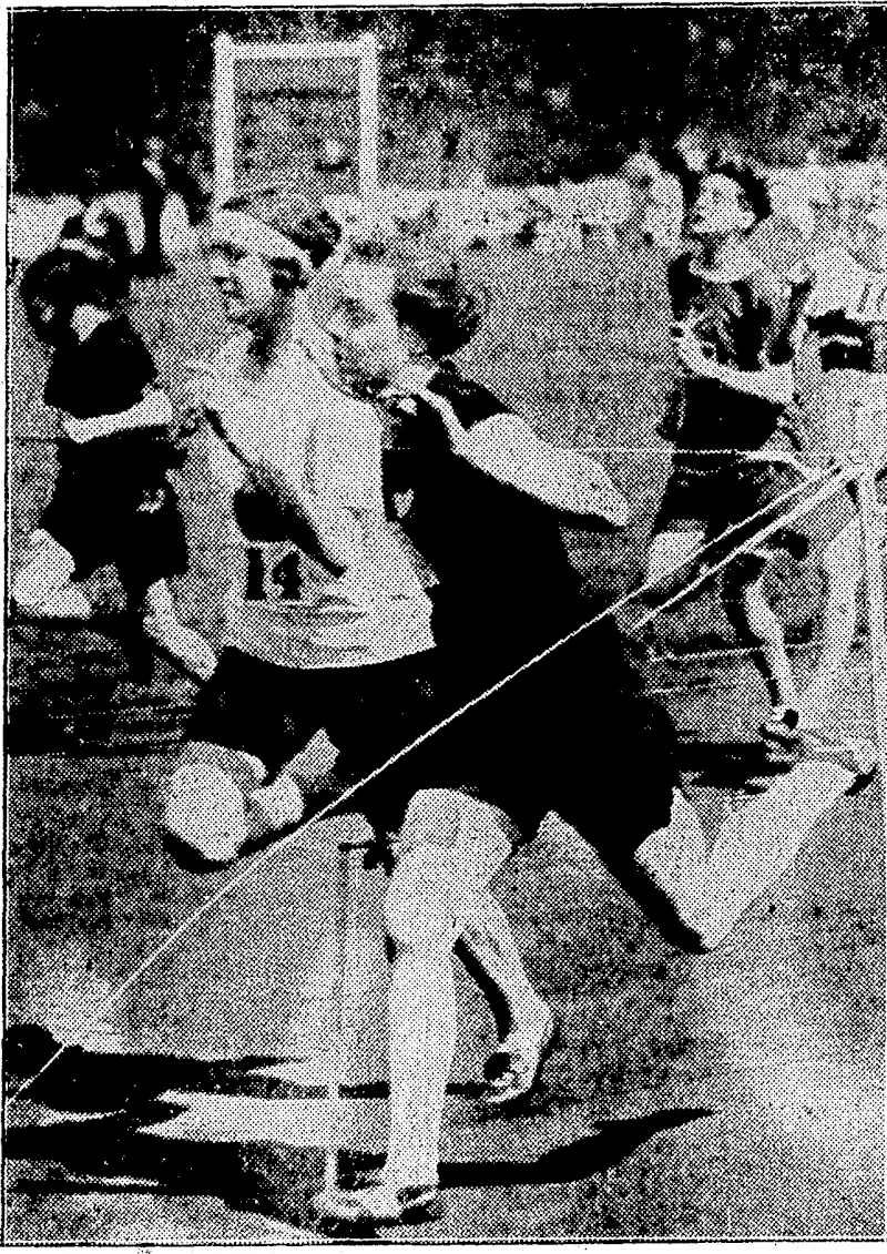 The-SixthsWomen's. Amateur Association Championships were held at Stamford: Bridge (London) on 14th July in glorious weather and before a largo crowd. The meeting had an international flavour with British, Dominions, and' Japanese competitors, who broke world's records. and equalled others. Miss N. Wilson (New Zealand) is here seen winning her heat in the 100 Yards Championship. (Evening Post, 30 August 1928)