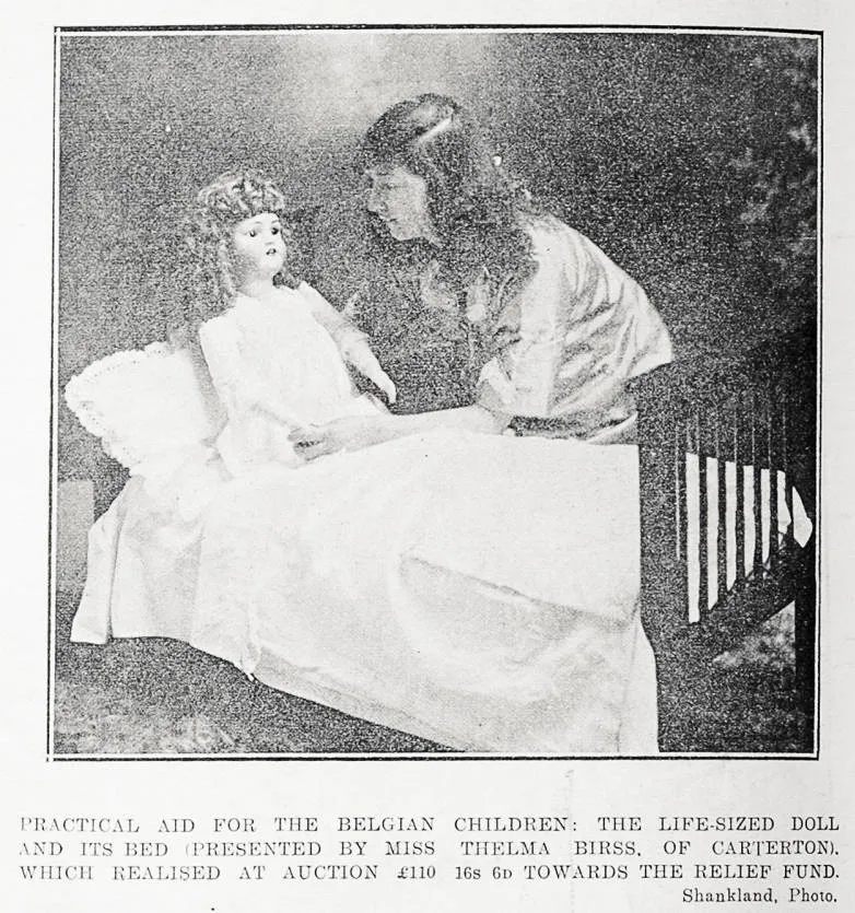 Practical aid for the Belgian children: the life-sized doll and its bed presented by Miss Thelma Birss of Carterton, which realised at auction £110 16s 6d towards the relief fund